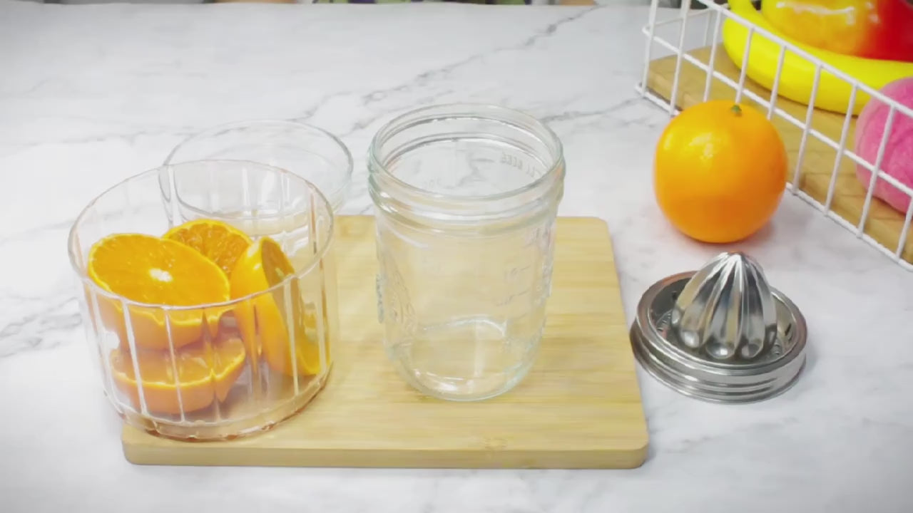 Load video: Mason Jar JUICER Attachment Lid for Wide-Mouth Jars